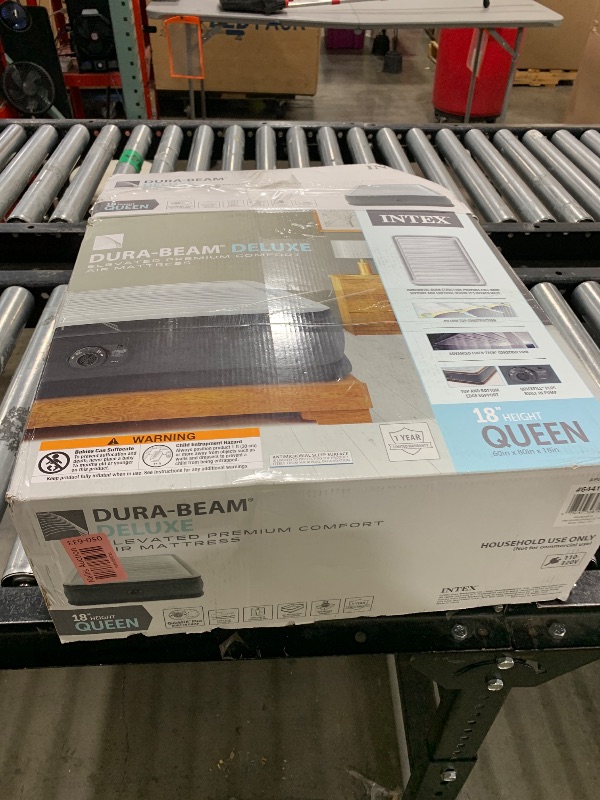 Photo 1 of Intex Dura-Beam Deluxe Comfort-Plush Elevated Air Mattress: Fiber-Tech – Queen Size – Built-in Electric Pump – 18in Bed Height – 600lb Weight Capacity
