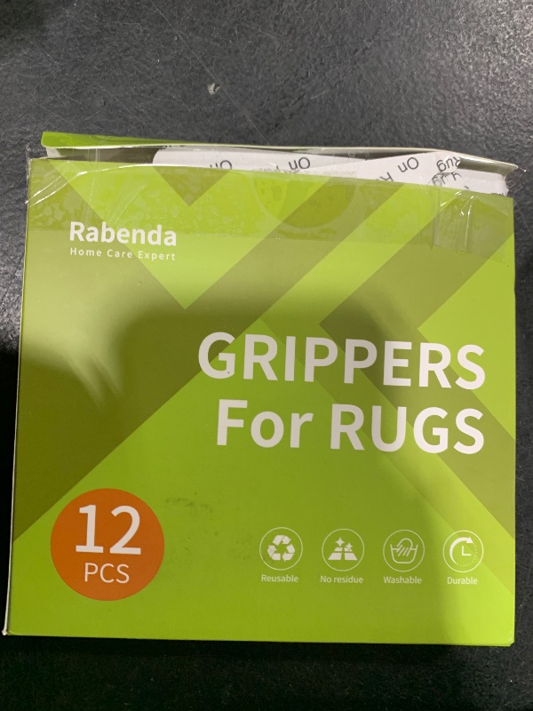 Photo 1 of Rabenda 12 Pcs Rug Tape, Non Slip Rug Pads Grippers for Hardwood Floors and Tiles, Reusable Carpet Tape for Area Rugs, Double-Sided Adhesive Rug Stickers Keep Corners Flat (Black)