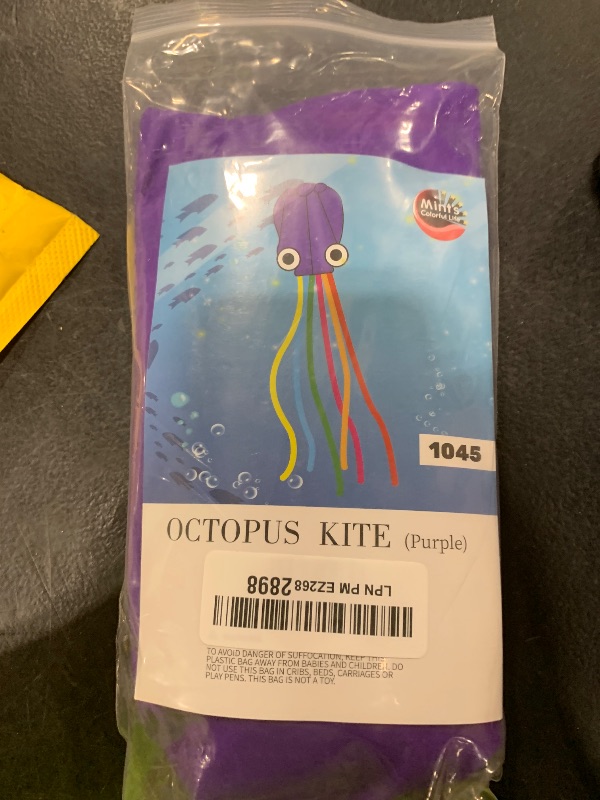 Photo 1 of Octopus Kite for Kids and Adults, Large 3D Software Octopus Kites with Long Tails, Huge Easy Flyer Kites for Beach Trip Family Games and Activities (Purple)