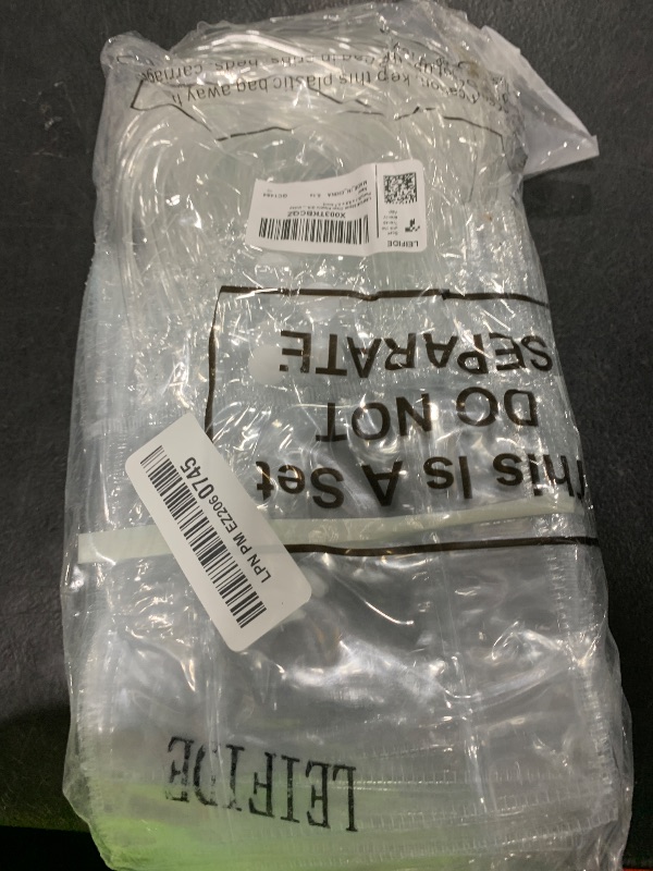 Photo 1 of LEIFIDE 50pcs Clear Plastic Gift Bags with Handles PVC Reusable Transparent Totes Bags for Goodie Candy School Birthday Party(5.1 x 5.9 x 2.7 Inch)