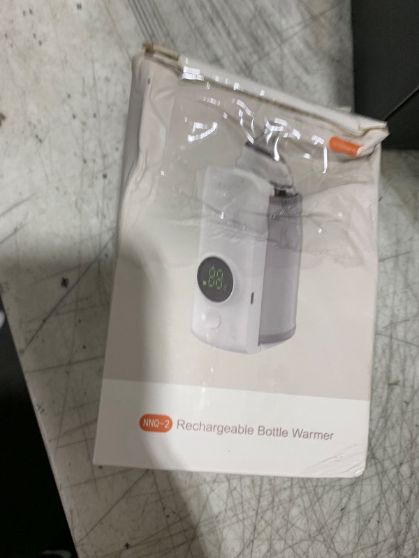 Photo 1 of Portable Bottle Warmer for Travel, Rapid Warming with Battery-Powered Temperature Display, Waterless Milk Warming for Comfortable Baby Feeding On The Go