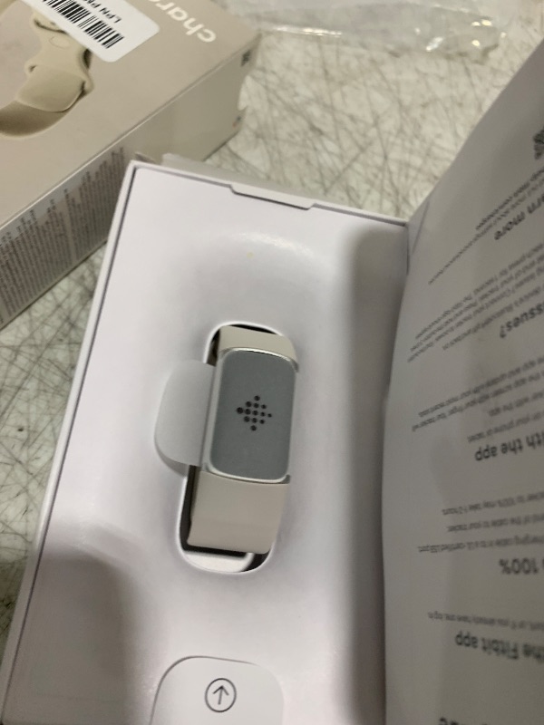 Photo 1 of Fitbit Charge 6 Fitness Tracker with Google apps, Heart Rate on Exercise Equipment, 6-Months Premium Membership Included, GPS, Health Tools and More, Porcelain/Silver, One Size (S & L Bands Included)