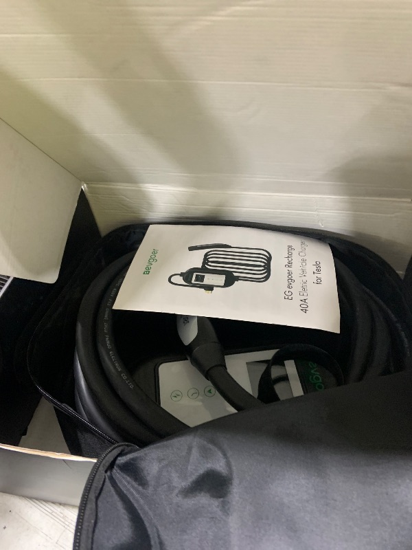 Photo 1 of Level 2 EV Charger for Tesla, 40A 240V NEMA 14-50P Portable Electric Charger,Adjust Current and Schedule Time for Home and Outdoor (16.4 Ft)