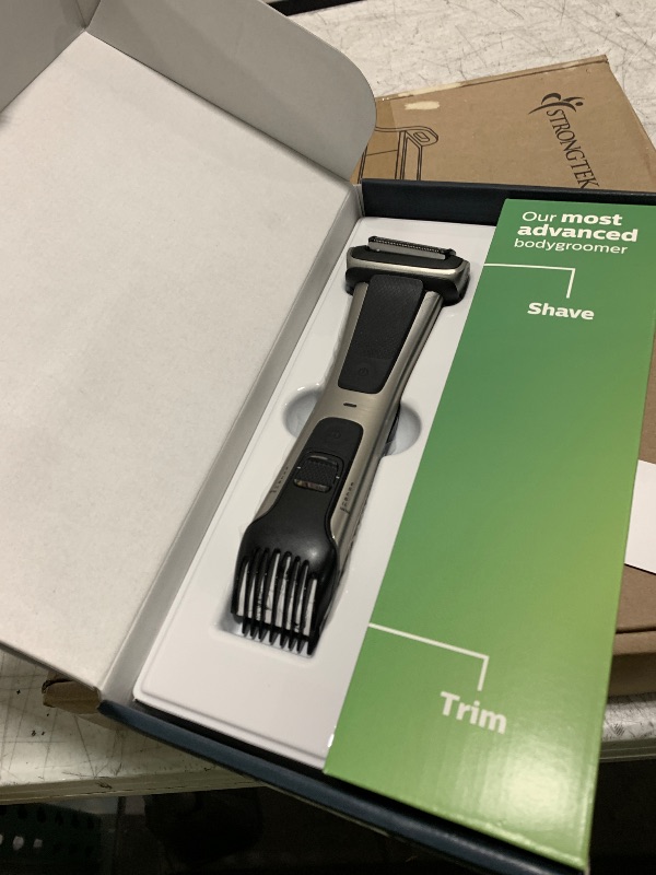 Photo 1 of Philips Norelco Bodygroom 7000 Series, Showerproof Groin and Body Trimmer for Men, Precise Body Grooming, Adjustable Comb, Safe Even Below The Belt, 80 Min. Runtime, Model BG7030/49