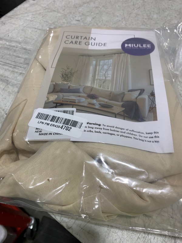 Photo 1 of MIULEE 2 Panels Solid Color Sheer Window Curtains Elegant Window Voile Panels/Drapes/Treatment for Bedroom Living Room (54X96 Inches Cream)