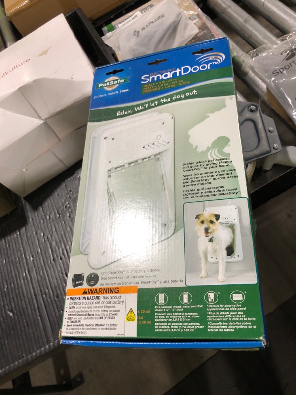 Photo 1 of ITEM IS USED ---------------------------------------------PetSafe Electronic Dog and Cat Door - Automatic Smart Door with Collar Sensor Key - for Cats and Small Dogs 4-15 lb