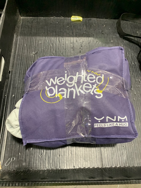 Photo 1 of weighted blanket unknown weight 