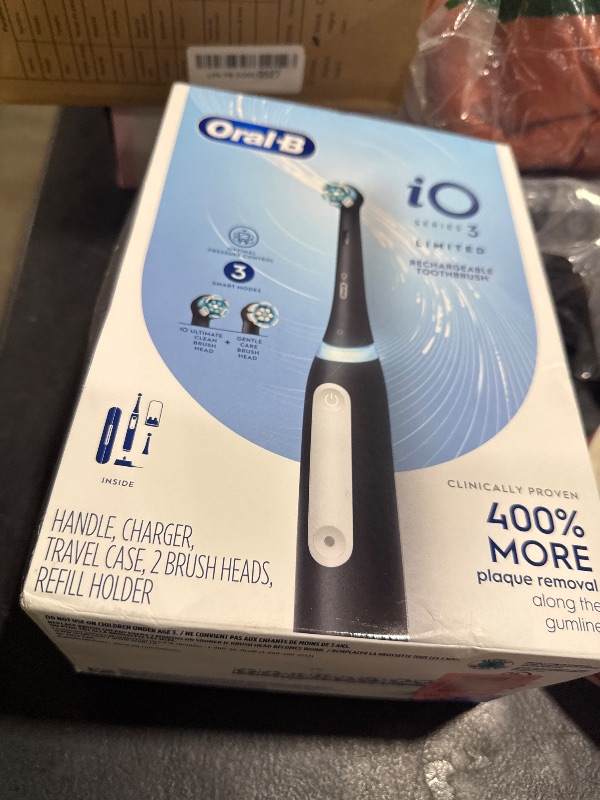 Photo 1 of Oral-B iO Deep Clean Rechargeable Electric Powered Toothbrush, Black with iO Series 3 Limited, 2 Brush Heads and Travel Case - Pressure Sensor to Protect Gums - 3 Cleaning Settings - 2 Minute Timer