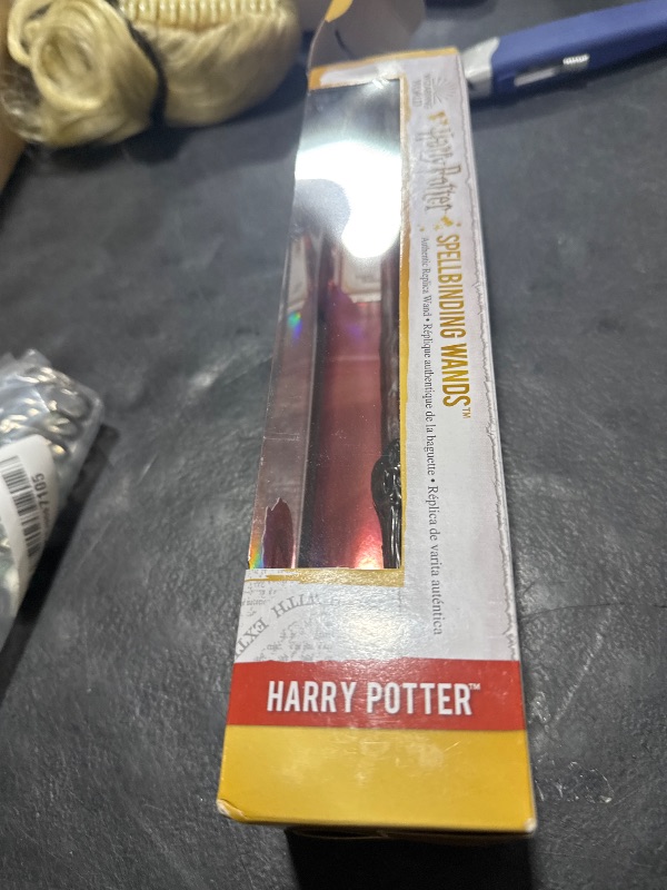Photo 1 of Wizarding World Harry Potter, 12-inch Spellbinding Harry Potter Wand with Collectible Spell Card, Kids Toys for Ages 6 and up