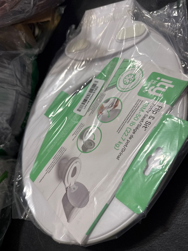 Photo 1 of Ingenuity: ity by Ingenuity Flip & Sit Potty Seat (White) – Easy to Set Up & Remove Potty Training Seat That Attaches to Adult Toilet Seat