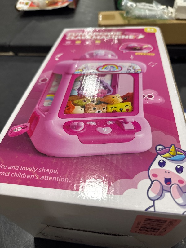 Photo 1 of Claw Machine for Kids, Mini Vending Machine Girls Unicorn Toys, Candy Grabber Prize Dispenser with Sound & 20 Mini Plush Toys, Electronic Arcade Game Indoor Toy for Home Party Birthday Gifts
