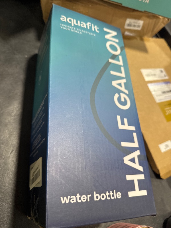 Photo 1 of AQUAFIT 64 oz Water Bottle with Time Marker - 2in1 Straw & Chug Lid - BPA Free Big Water Bottle with Straw - Gym Water Bottle with Strap - Water Jug (64 Ounces, Nebula)