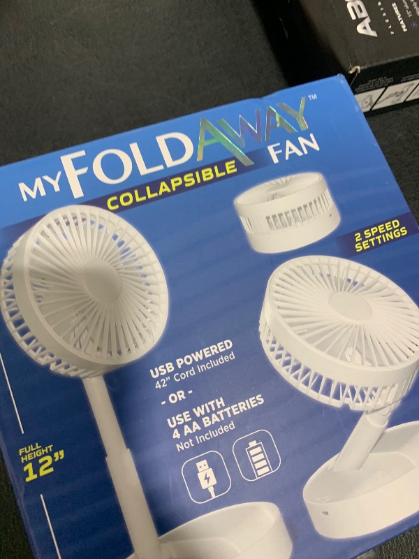Photo 1 of Bell+Howell MY FOLDAWAY FAN Rechargeable Fan Collapsible Fan Ultra Lightweight Portable Compact Extendable to 12" High with 2 Speed Modes As Seen On TV