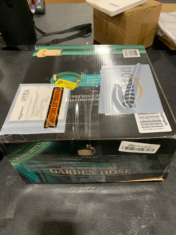 Photo 1 of LightHose Garden Hose, NON-EXPANDABLE Garden Hose, Super Light Weight Hose, No Burst, 3/4 inch Solid Brass Connectors, 100 Ft, Grassy Green