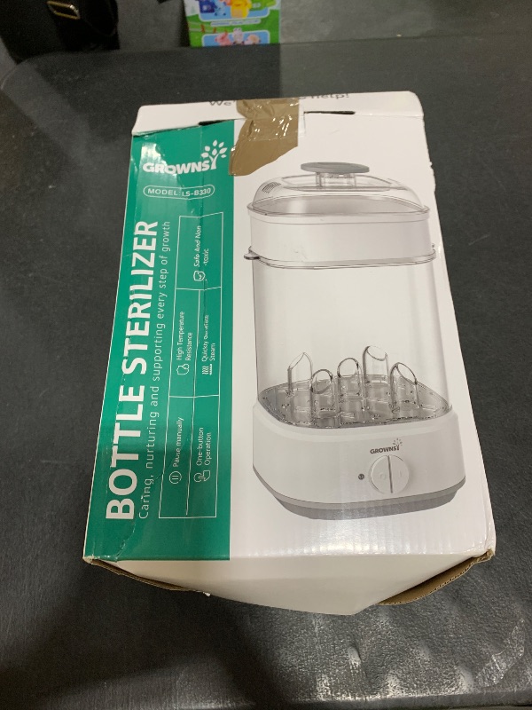 Photo 1 of Bottle Sterilizer, Baby Bottle Steam Sterilizer, Electric Baby Bottle Sanitizer with Timer for Baby Bottles, Pacifiers, Pump Parts