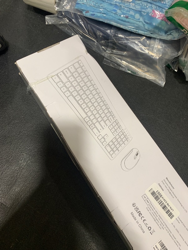 Photo 1 of Wireless Keyboard and Mouse Combo - Full Size Slim Thin Wireless Keyboard Mouse with Numeric Keypad 2.4G Stable Connection Adjustable DPI (White & Silver)