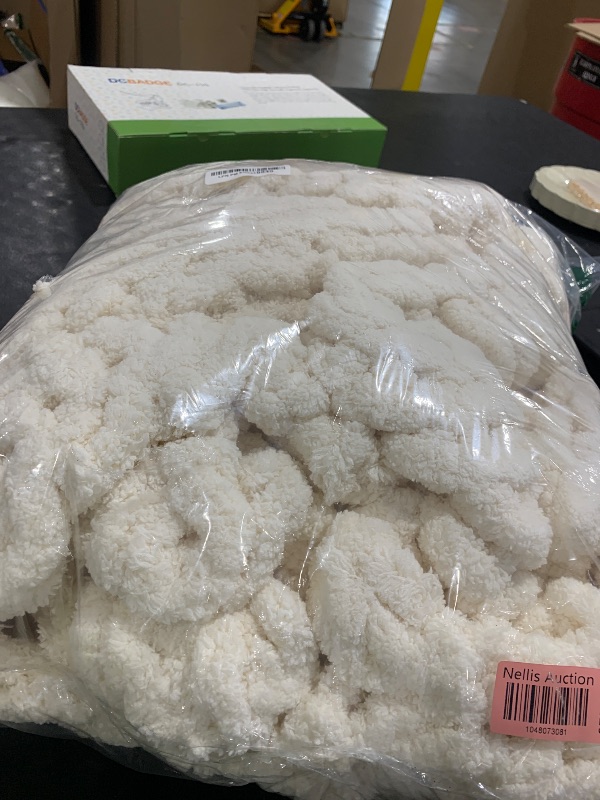 Photo 1 of White fluffy knitted blanket