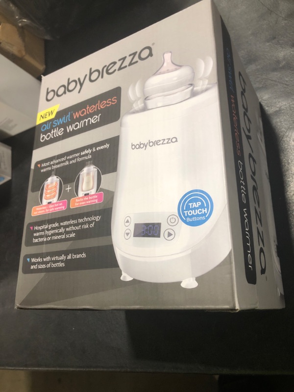 Photo 1 of Baby Brezza AirSwirl Waterless Baby Bottle Warmer - Safely Warm Breastmilk + Formula - Bottles Stay Dry + Nutrients are Protected - Works with Nearly All Bottles