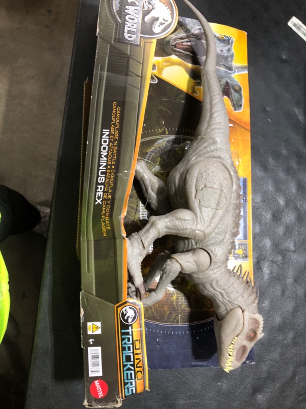 Photo 1 of Jurassic World Indominus Rex Dinosaur Toy with Lights, Sounds, Chomp and Side to Side Neck Motion, Camouflage N Battle I-Rex, Digital Play