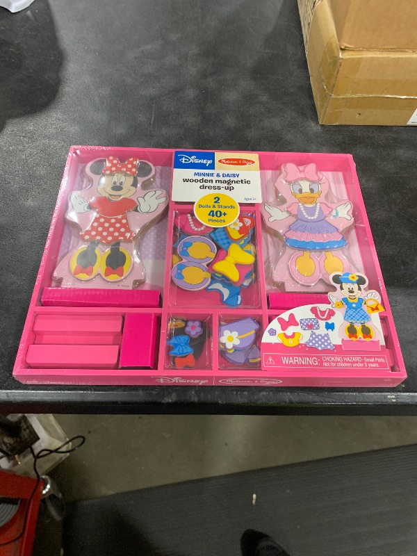 Photo 1 of Melissa & Doug Disney Minnie Mouse and Daisy Duck Magnetic Dress-Up Wooden Doll Pretend Play Set (40+ pcs) Minnie Mouse Toys, Disney Dress Up Dolls for Preschoolers and Kids Ages 3+