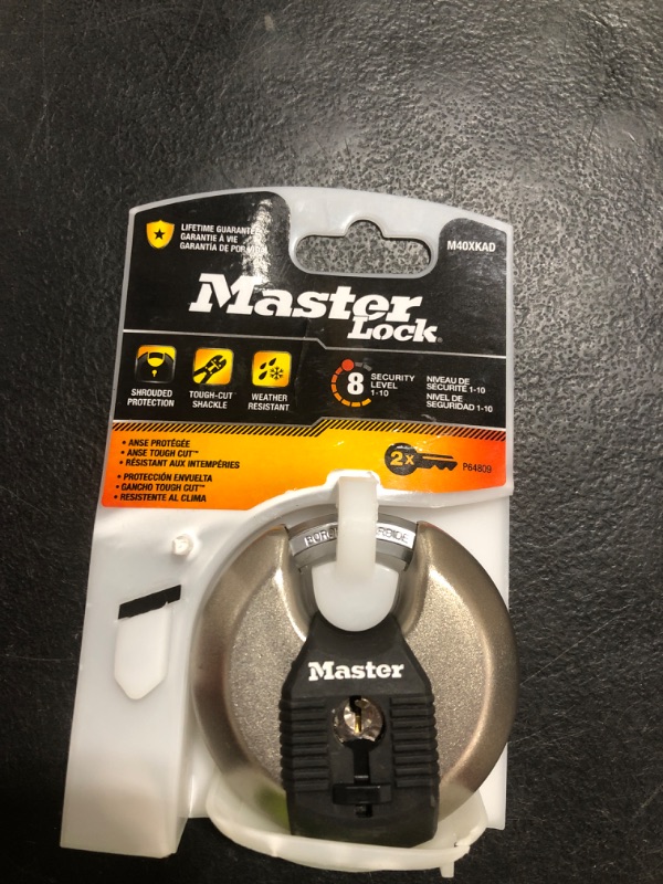 Photo 1 of Master Lock Magnum Heavy-Duty Stainless-Steel Discus Padlock with Keys, Keyed Alike Heavy Duty Storage Lock for Indoor or Outdoor Use, M40XKAD