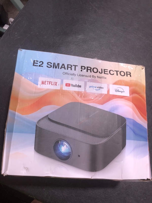 Photo 1 of [2025 Netflix-Official | 386+ Built-in Apps] DBPOWER E2 Smart Projector with WiFi and Bluetooth, Mini Projector 4K Support with Netflix, Youtube, Disney+, Hulu, Max, Crunchyroll w Portable Case