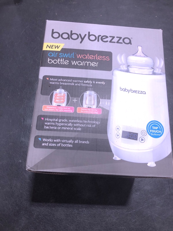 Photo 1 of Baby Brezza AirSwirl Waterless Baby Bottle Warmer - Safely Warm Breastmilk + Formula - Bottles Stay Dry + Nutrients are Protected - Works with Nearly All Bottles