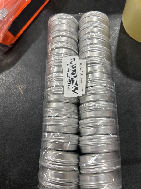 Photo 1 of 1 Ounce Aluminum Tin Jar Refillable Containers 30ml Aluminum Screw Lid Round Tin Container Bottle for Cosmetic,Lip Balm, Cream, 24 Pack