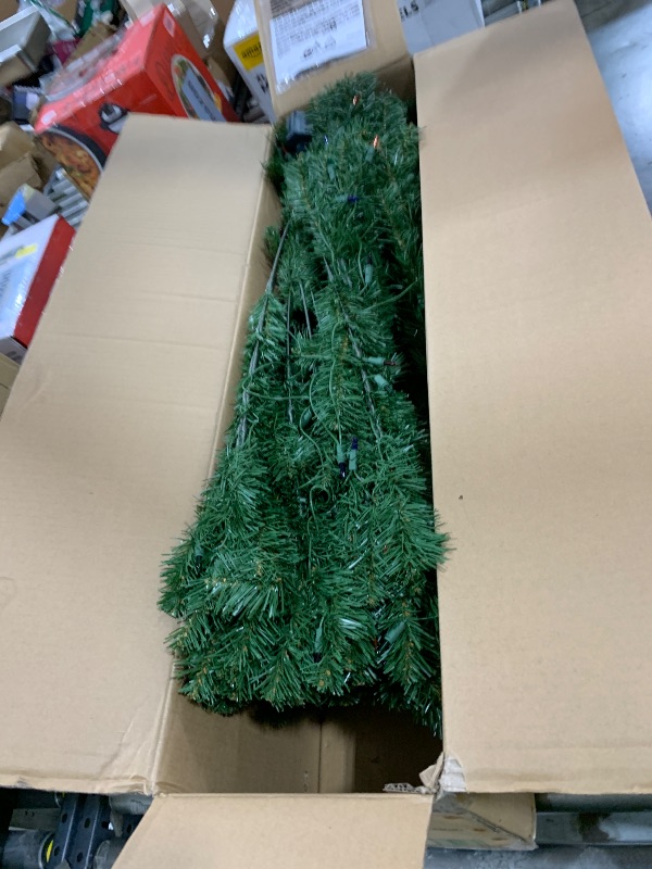 Photo 1 of National Tree Company Pre-Lit Artificial Medium Christmas Tree, Green, Kincaid Spruce, Multicolor Lights, Includes Stand, 6 Feet