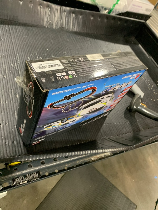 Photo 1 of AGM MASETCH Slot Car Racing Track Set with 4 Unique Slot Cars, Battery Powered or Electric Car Track, Gift Toys for Boys Girls 4-12 Years Old