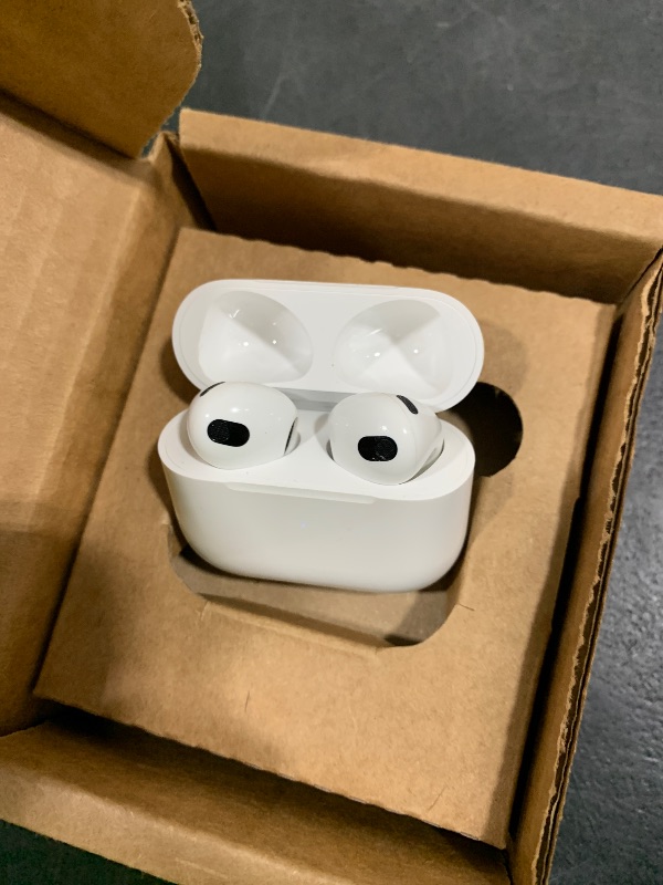 Photo 1 of Apple AirPods (3rd Generation) Wireless Ear Buds, Bluetooth Headphones, Personalized Spatial Audio, Sweat and Water Resistant, Lightning Charging Case Included, Up to 30 Hours of Battery Life *** LEFT AIRPOD DOSENT WORK  ****