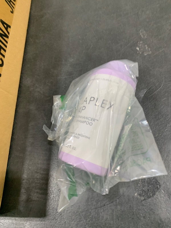 Photo 1 of Olaplex No. 4P Blonde Enhancer Purple Toning Shampoo, Repairs, Hydrates, & Brightens All Blonde, Lightened, & Grey Hair, 8.5 fl oz