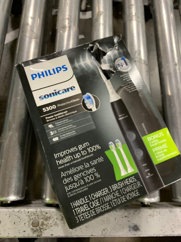 Photo 1 of Philips Sonicare ProtectiveClean 5300 Rechargeable Electric Toothbrush, with Pressure Sensor, 3 Cleaning Modes, SmarTimer and QuadPacer, with 2 Bonus Brush Heads, Travel Case, Black, Model HX6423/34