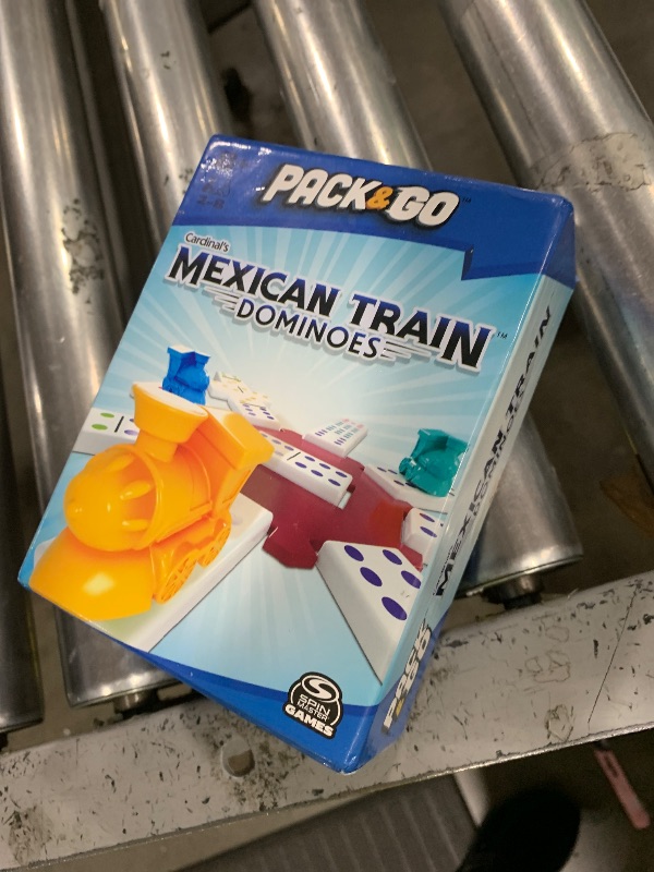 Photo 1 of Pack & Go Mexican Train Dominoes from Spin Master Games Portable Dominoes Set Kids Games Classic Board Games for Adults and Kids Ages 8 and Up