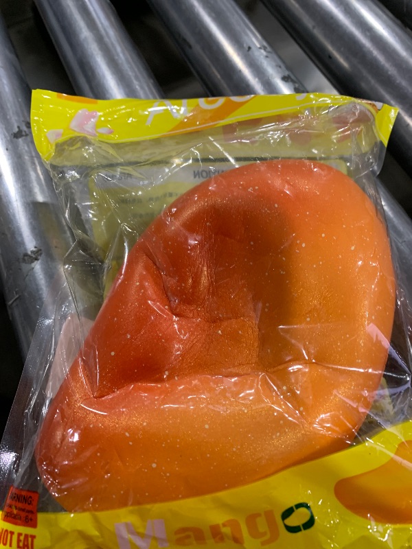 Photo 1 of Areedy Squishy Gold Mango Colossal Slow Rising Scented Fruit Squishies