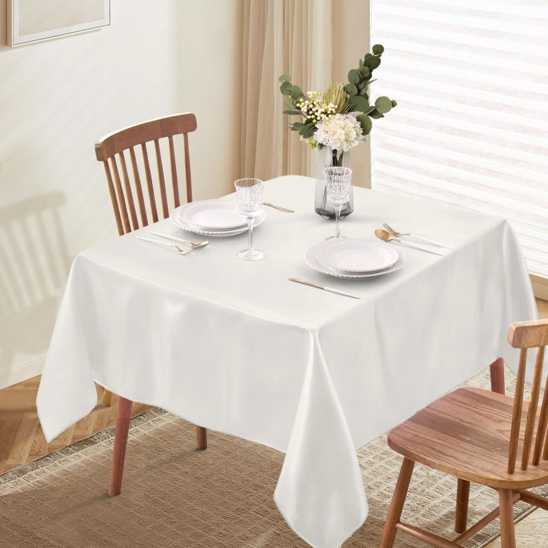 Photo 1 of Horbaunal Ivory Satin Tablecloth 54 x 54 Inches Square Table Cloth Bright Silky Table Cover Overlay Dining Tablecloths for Wedding Party Banquets