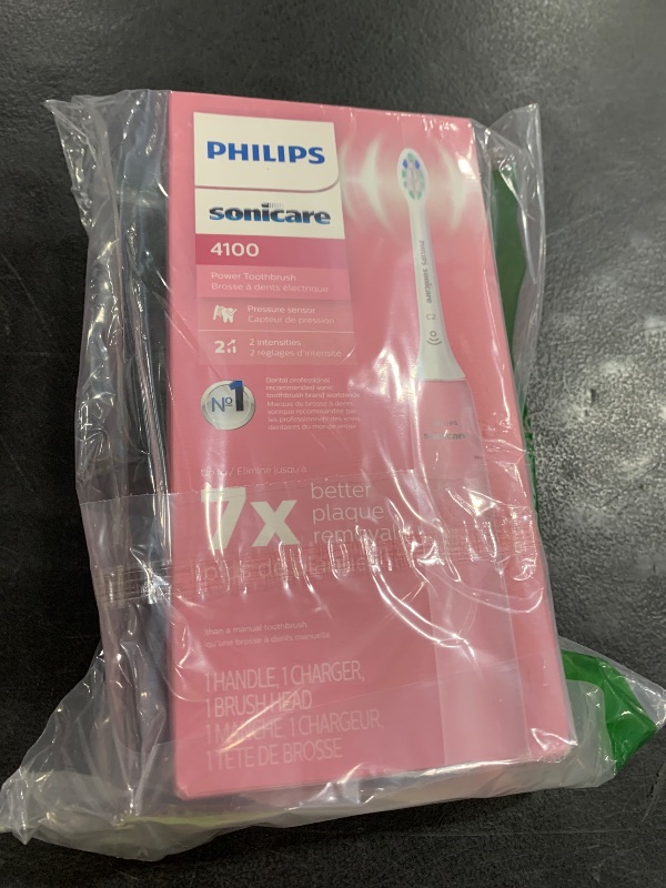 Photo 1 of Philips Sonicare 4100 Rechargeable Electric Toothbrush, with Pressure Sensor, 2 Intensity Settings, SmarTimer and QuadPacer, 14-Day Battery Life, Deep Pink, Model HX3681/26