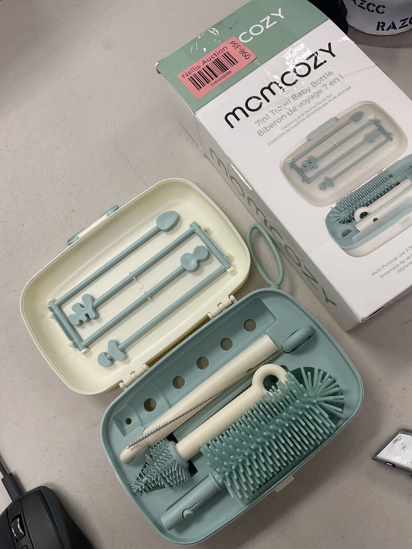 Photo 1 of Momcozy Bottle Brush Set - Baby Bottle Cleaner Kit with Silicone Brush, Nipple Brush, Straw Brush, Soap Dispenser, Drying Rack - 7 in 1 Bottle Cleaning Tool for Home and Travel
