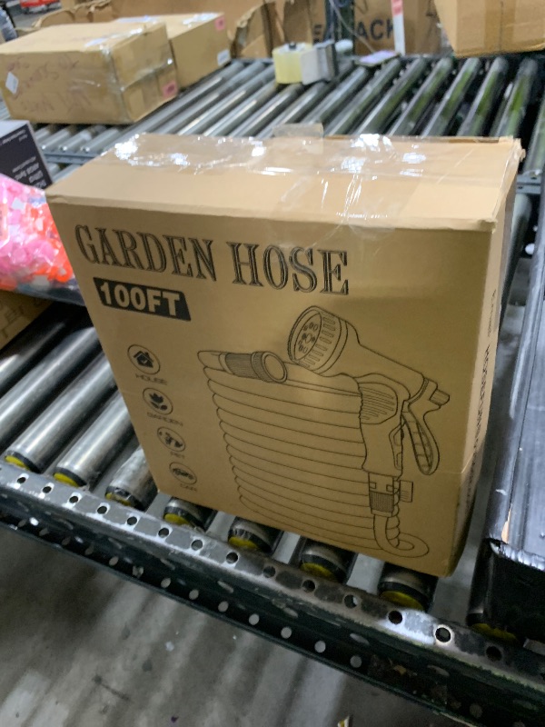 Photo 1 of Garden Hose 100 ft, Non-Expandable Water Hose with 10 Function Nozzles, Portable, Kink-Free, Outdoor and Garden Flexible Hose Pipe