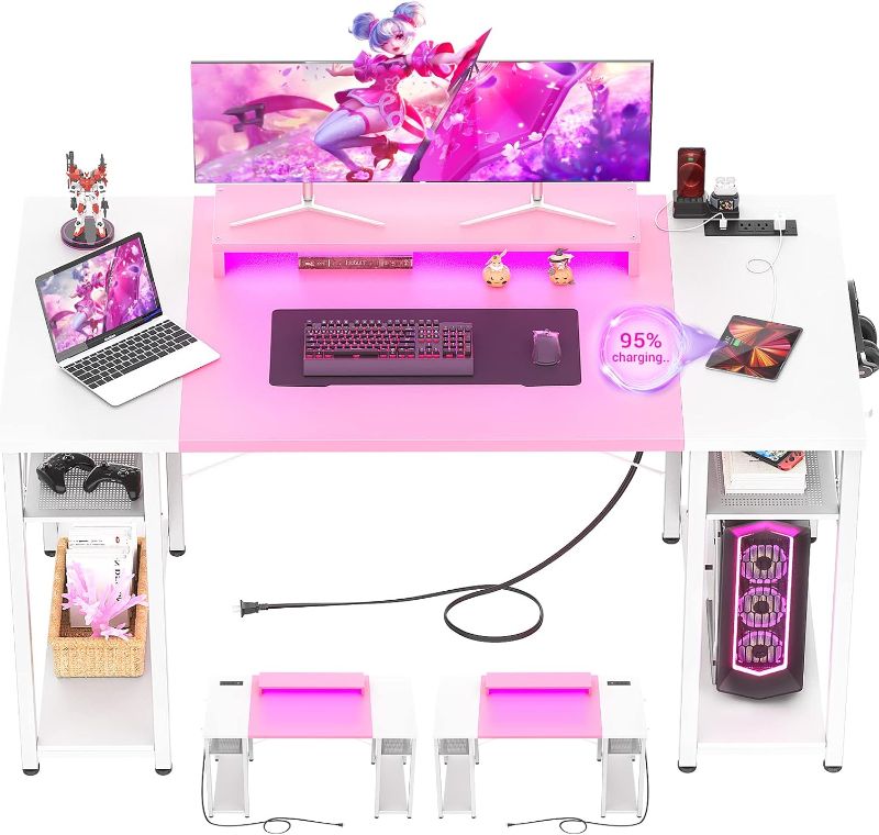 Photo 1 of Armocity Computer Desk with LED Lights, 55 Inch Desk with Power Outlet and USB, Reversible Large Desk with Moveable Monitor Stand, 55.2'' Gaming PC Table for Home Office, Workstation, Pink and White
