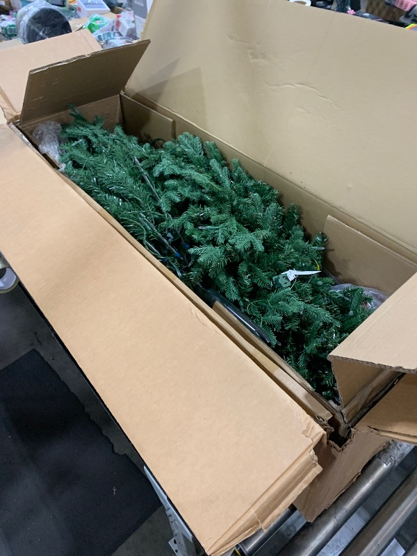 Photo 1 of National Tree Company Pre-Lit 'Feel Real' Artificial Slim Christmas Tree, Green, Tiffany Fir, White Lights, Includes Stand, 7.5 Feet