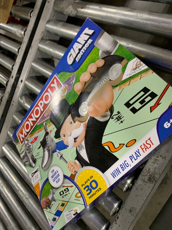 Photo 1 of Spin Master Games, Monopoly Giant Edition, Classic Family Board Game for Indoor & Outdoor Play with Oversized Board, Screenless Activity, 2-4 Players, for Ages 6 & Up