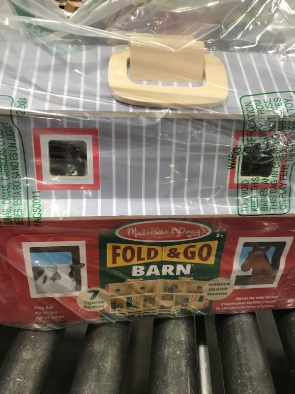 Photo 1 of Melissa & Doug Fold and Go Wooden Barn with 7 Animal Play Figures - Farm Animals Barn Toy, Portable Toys, Farm Toys for Kids and Toddlers Ages 3+