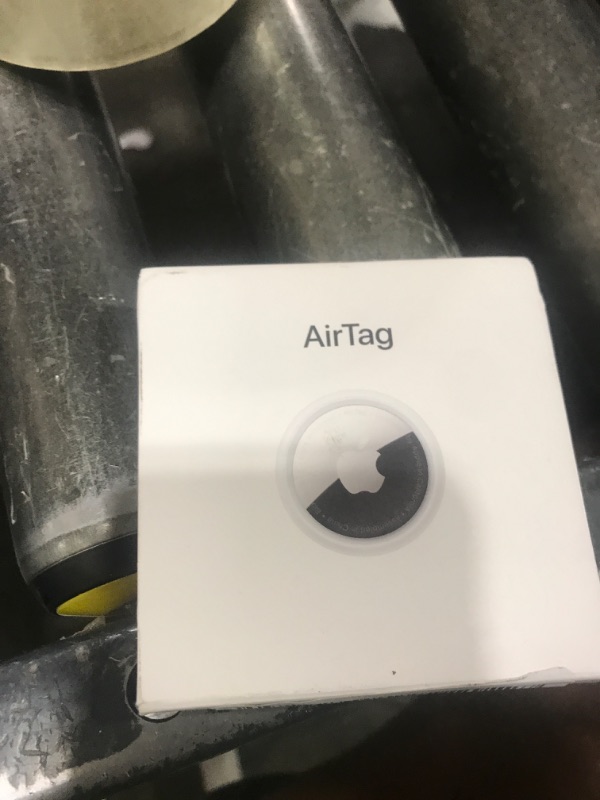 Photo 1 of Apple AirTag. Keep Track of and find Your Keys, Wallet, Luggage, Backpack, and More. Simple one-tap Set up with iPhone or iPad
