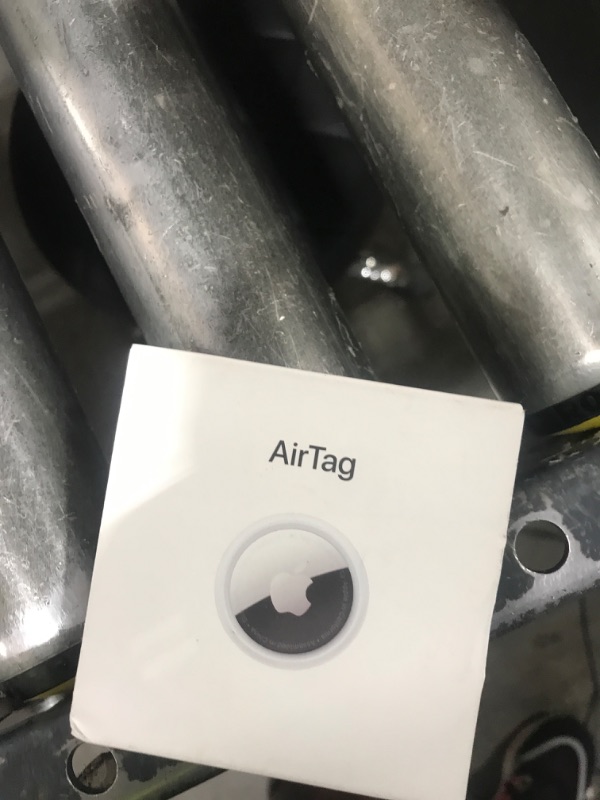Photo 1 of Apple AirTag. Keep Track of and find Your Keys, Wallet, Luggage, Backpack, and More. Simple one-tap Set up with iPhone or iPad