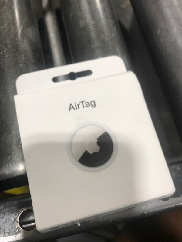 Photo 1 of Apple AirTag. Keep Track of and find Your Keys, Wallet, Luggage, Backpack, and More. Simple one-tap Set up with iPhone or iPad