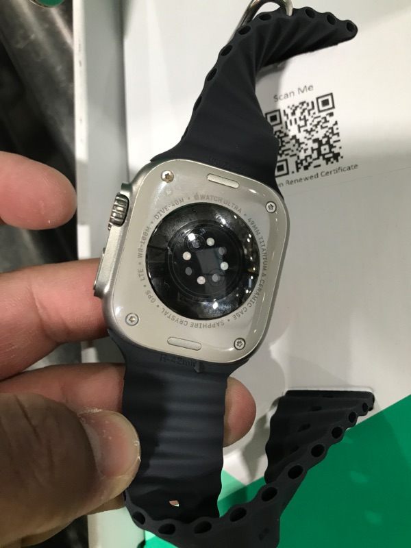 Photo 1 of Apple Watch Ultra [GPS + Cellular 49mm] Titanium Case with Midnight Ocean Band, One Size (Renewed Premium)