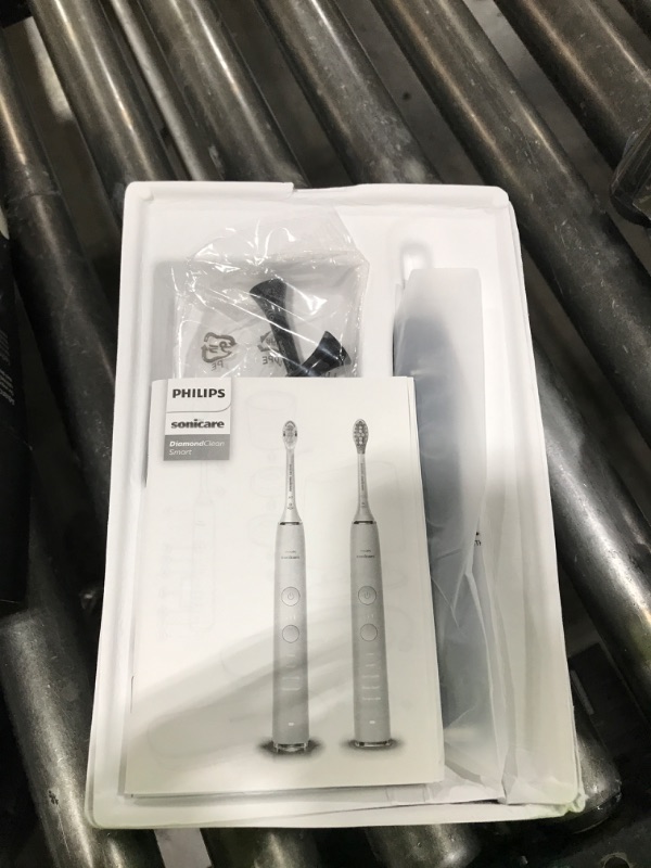 Photo 1 of Philips Sonicare DiamondClean Smart 9500 Electric Toothbrush, Sonic Toothbrush with App, Pressure Sensor, Brush Head Detection, 5 Brushing Modes and 3 Intensity Levels, Black, Model HX9923/11