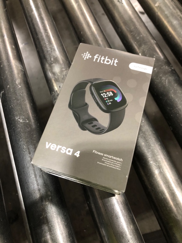 Photo 1 of Fitbit Versa 4 Fitness Smartwatch with Daily Readiness, GPS, 24/7 Heart Rate, 40+ Exercise Modes, Sleep Tracking and more, Black/Graphite, One Size (S & L Bands Included)
