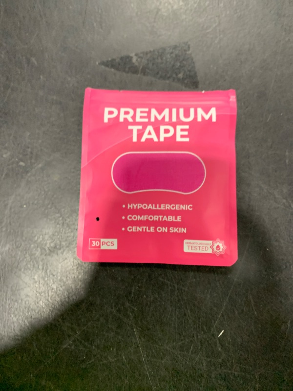 Photo 1 of 30 Pcs Pink Premium Strip Tapes Hypoallergenic Painless Removal Tape, Strong Adhesive Tape Multi-Functional Suitable for Sleeping, Books, Bowling, Heel